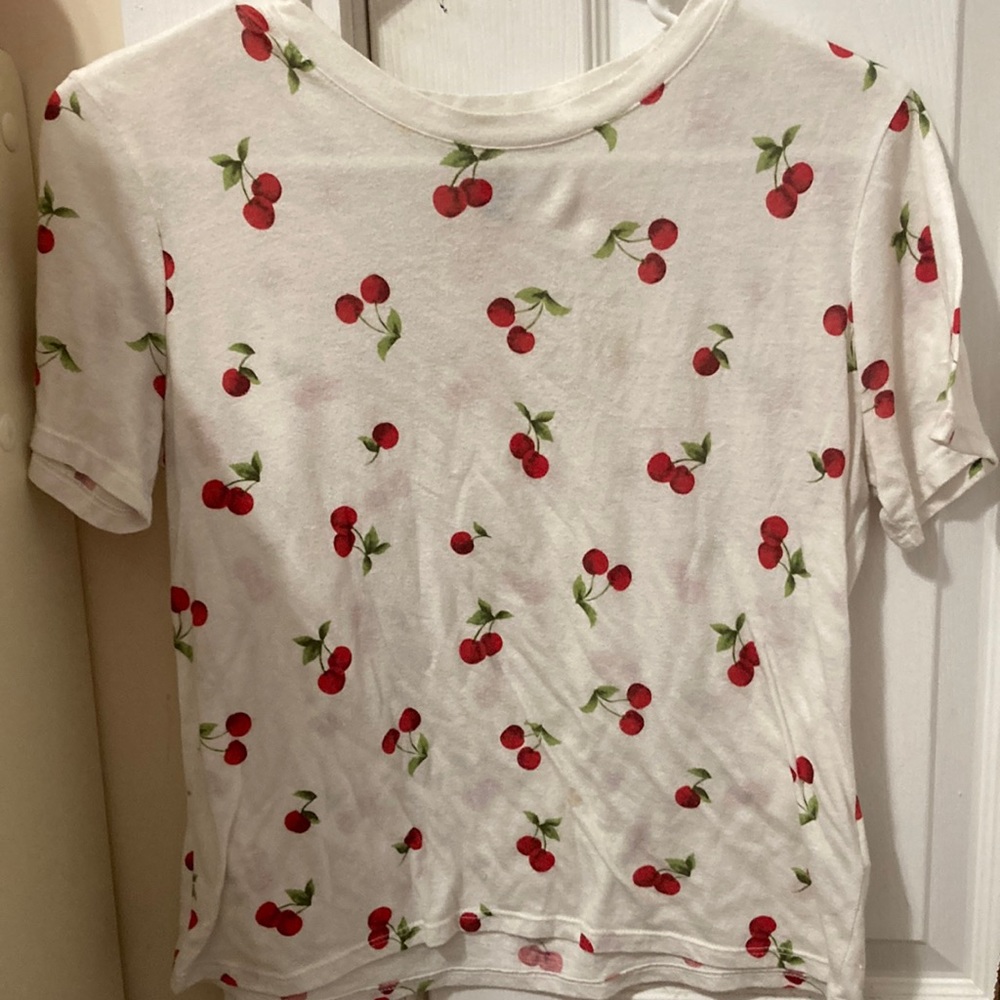 I am selling this Forever 21 cherry shirt and it’s really comfortable